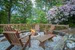 Relaxing adirondack chairs around firepit